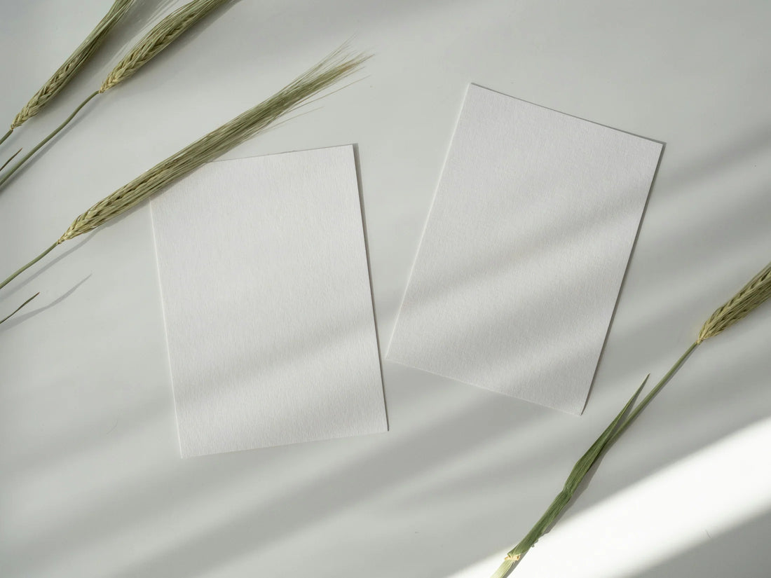 Two blank memorial cards