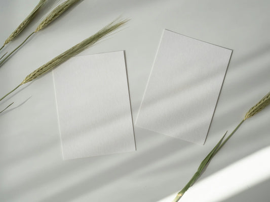Two blank memorial cards