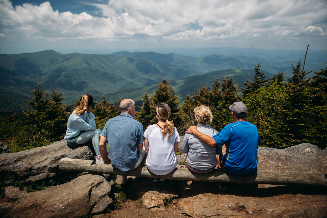 A family talking about death and dying on the top of a mountain
