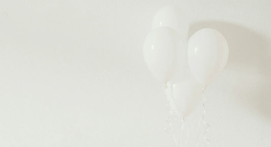 Balloons celebrating a deceased loved one's birthday