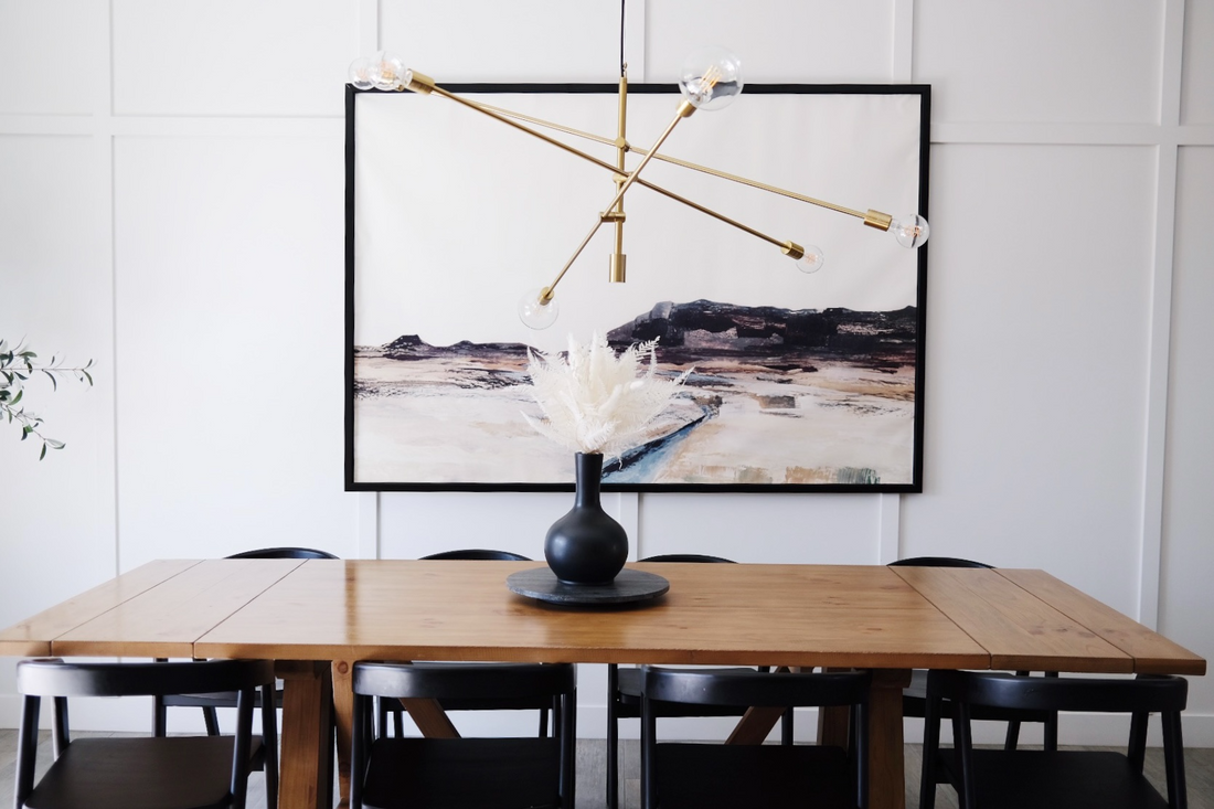 Urn vase sitting on a dining room table 